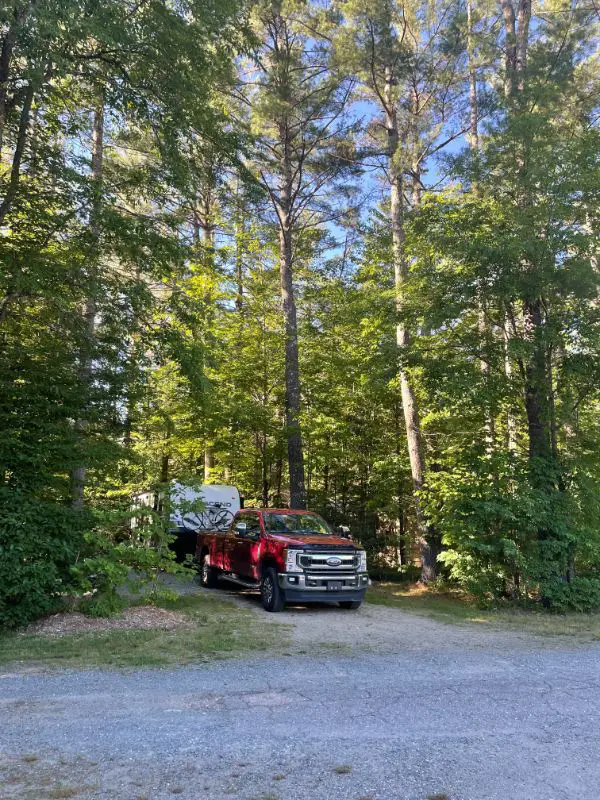 rv trailer reversing into campsite